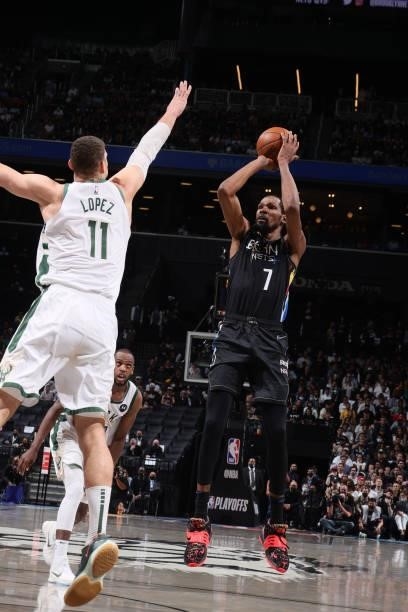 Kevin Durant of the Brooklyn Nets shoots a three point basket against the Milwaukee Bucks during Round 2, Game 5 of the 2021 NBA Playoffs on June 15,...
