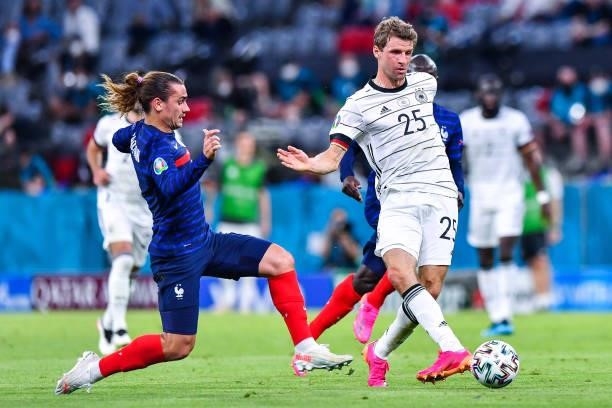 Antoine GRIEZMANN of France and Thomas MULLER of Germany during the UEFA European Championship football match between France and Allemagne at Allianz...