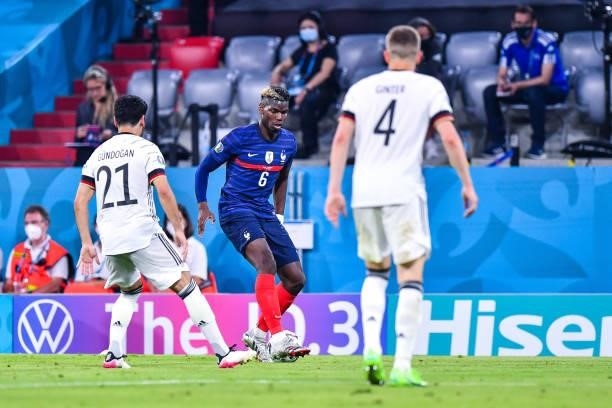 Ilkay GUNDOGAN of Germany and Paul POGBA of France during the UEFA European Championship football match between France and Allemagne at Allianz Arena...