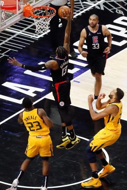 Paul George of the LA Clippers dunks the ball against the Utah Jazz during Round 2, Game 4 of 2021 NBA Playoffs on June 14, 2021 at STAPLES Center in...