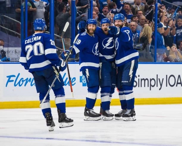 Jan Rutta of the Tampa Bay Lightning celebrates his goal with teammates Blake Coleman, Barclay Goodrow, and Victor Hedman against the New York...
