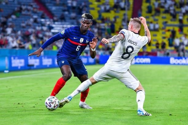 Paul POGBA of France and Toni KROOS of Germany during the UEFA European Championship football match between France and Allemagne at Allianz Arena on...