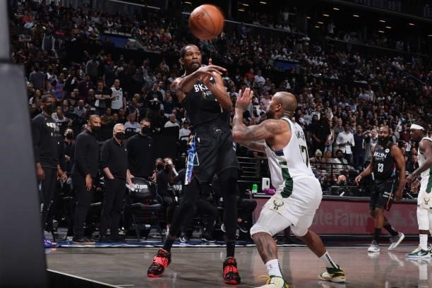 Kevin Durant of the Brooklyn Nets passes the ball against the Milwaukee Bucks during Round 2, Game 5 of the 2021 NBA Playoffs on June 15, 2021 at...