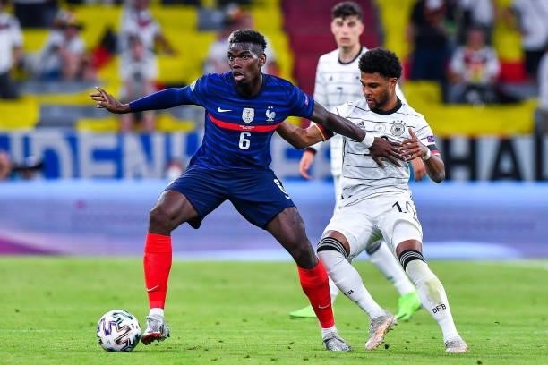 Paul POGBA of France and Serge GNABRY of Germany during the UEFA European Championship football match between France and Allemagne at Allianz Arena...