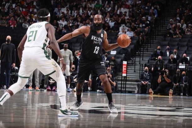 James Harden of the Brooklyn Nets passes the ball during Round 2, Game 5 of the 2021 NBA Playoffs on June 15, 2021 at Barclays Center in Brooklyn,...
