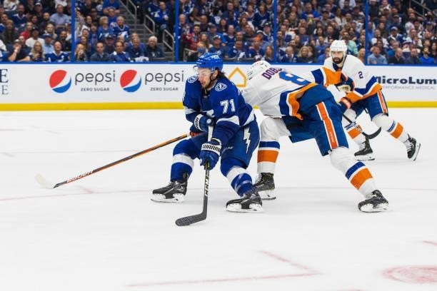 Anthony Cirelli of the Tampa Bay Lightning skates against Noah Dobson of the New York Islanders during the third period in Game Two of the Stanley...