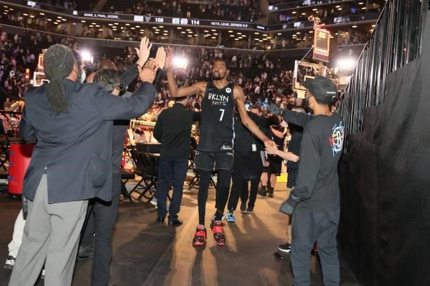 Kevin Durant of the Brooklyn Nets high fives after the game against the Milwaukee Bucks during Round 2, Game 5 of the 2021 NBA Playoffs on June 15,...