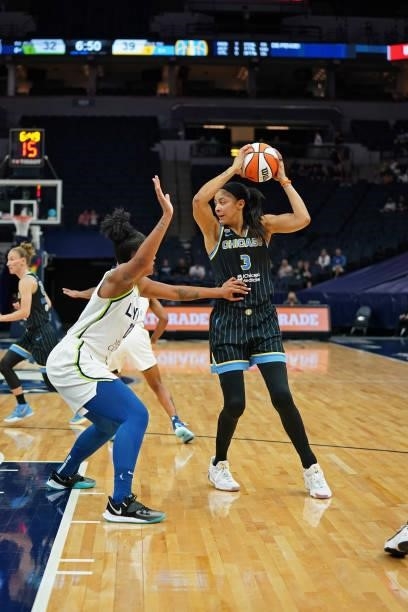 Candace Parker of the Chicago Sky looks to pass against the Minnesota Lynx on June 15, 2021 at Target Center in Minneapolis, Minnesota. NOTE TO USER:...