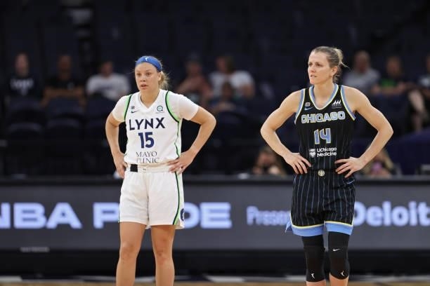 Rachel Banham of the Minnesota Lynx and Allie Quigley of the Chicago Sky looks on during the game on June 15, 2021 at Target Center in Minneapolis,...