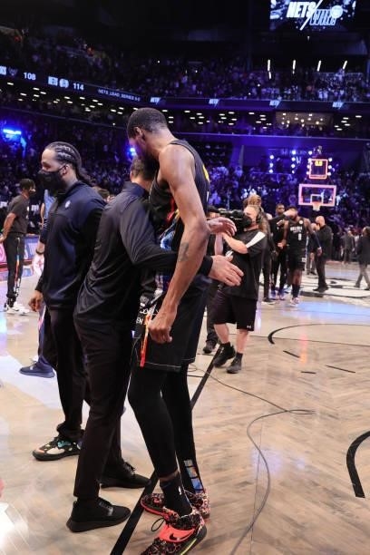 Head Coach Steve Nash of the Brooklyn Nets hugs Kevin Durant of the Brooklyn Nets after the game against the Milwaukee Bucks during Round 2, Game 5...