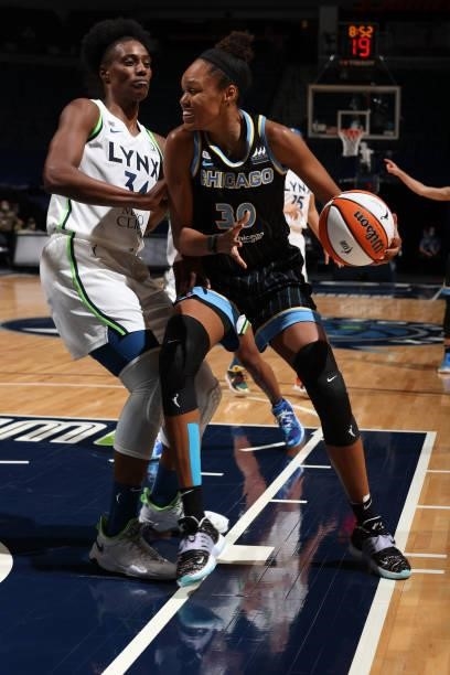 Azurá Stevens of the Chicago Sky handles the ball during the game against the Minnesota Lynx on June 15, 2021 at Target Center in Minneapolis,...