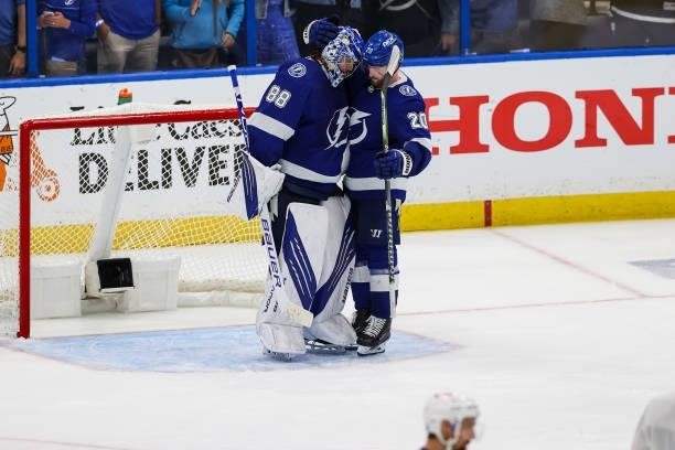 Goaile Andrei Vasilevskiy and Blake Coleman of the Tampa Bay Lightning celebrate the win against the New York Islanders in Game Two of the Stanley...