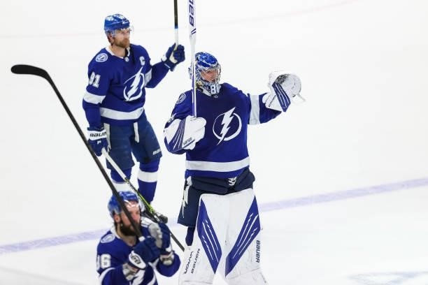 Goaile Andrei Vasilevskiy and Steven Stamkos of the Tampa Bay Lightning celebrate the win against the New York Islanders in Game Two of the Stanley...