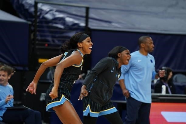 Lexie Brown of the Chicago Sky and Dana Evans of the Chicago Sky celebrate from the sideline during the game against the Minnesota Lynx on June 15,...