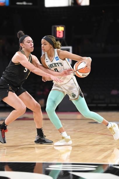 Leaonna Odom of the New York Liberty handles the ball against Dearica Hamby of the Las Vegas Aces on June 15, 2021 at Michelob ULTRA Arena in Las...