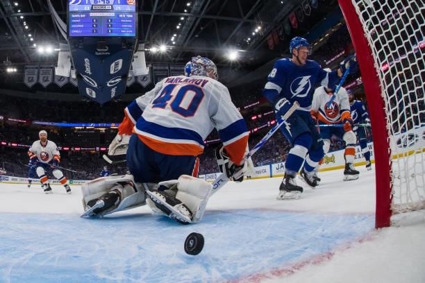 Ondrej Palat of the Tampa Bay Lightning scores against goalie Semyon Varlamov of the New York Islanders in Game Two of the Stanley Cup Semifinals of...