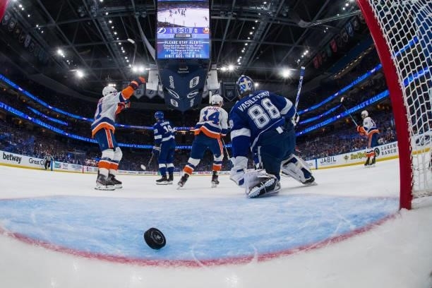 Goalie Andrei Vasilevskiy of the Tampa Bay Lightning gives up a goal against Travis Zajac and the New York Islanders in Game Two of the Stanley Cup...