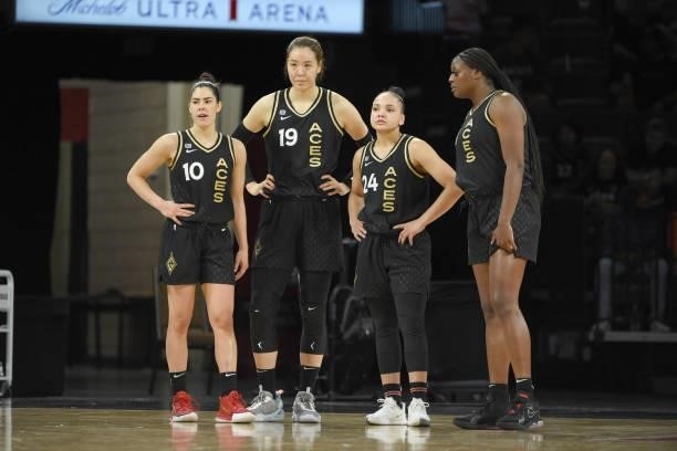 Kelsey Plum, JiSu Park and Destiny Slocum of the Las Vegas Aces look on during the game against the New York Liberty on June 15, 2021 at Michelob...