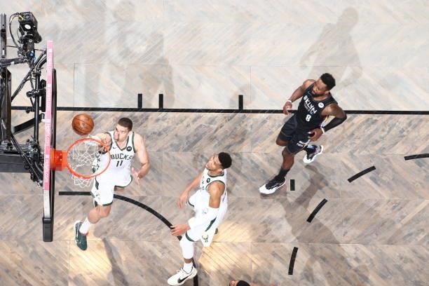 Brook Lopez of the Milwaukee Bucks shoots the ball against the Brooklyn Nets during Round 2, Game 5 of the 2021 NBA Playoffs on June 15, 2021 at...