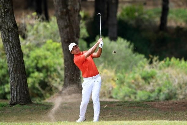 Ashun Wu of China plays his third shot on the eight hole during Day Two of the Challenge de Espana at Iberostar Real Club de Golf Novo Sancti Petri...