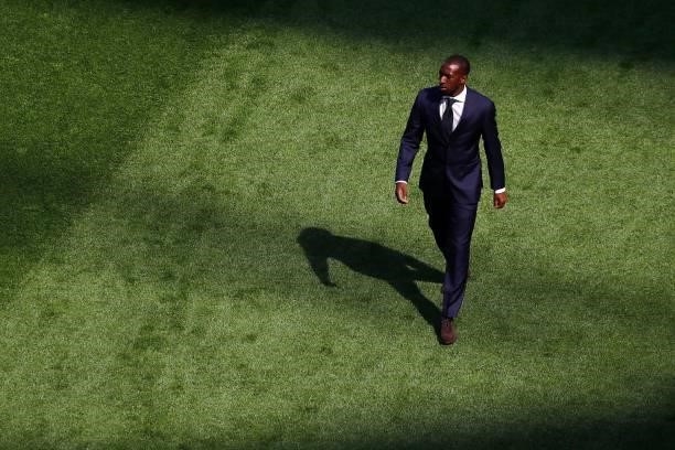 Finland's midfielder Glen Kamara walks on the pitch prior to the UEFA EURO 2020 Group B football match between Finland and Russia at the Saint...