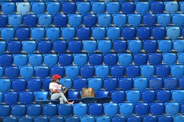 Russia fan take her seat prior to the UEFA EURO 2020 Group B football match between Finland and Russia at the Saint Petersburg Stadium in Saint...