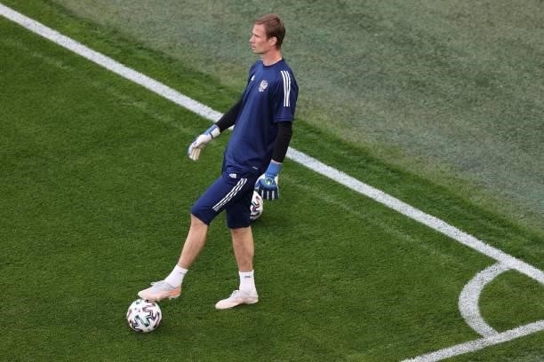 Russia's goalkeeper Matvei Safonov warms up prior to the UEFA EURO 2020 Group B football match between Finland and Russia at the Saint Petersburg...