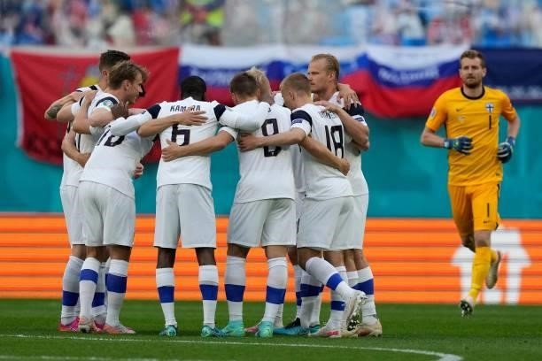 Finland's players huddle prior to the UEFA EURO 2020 Group B football match between Finland and Russia at the Saint Petersburg Stadium in Saint...