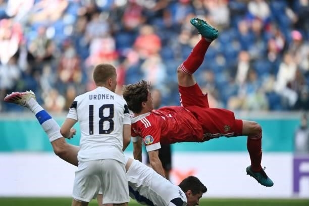 Russia's defender Mario Fernandes is injured during the UEFA EURO 2020 Group B football match between Finland and Russia at the Saint Petersburg...