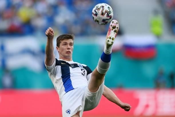 Finland's defender Daniel O'Shaughnessy takes the ball during the UEFA EURO 2020 Group B football match between Finland and Russia at the Saint...