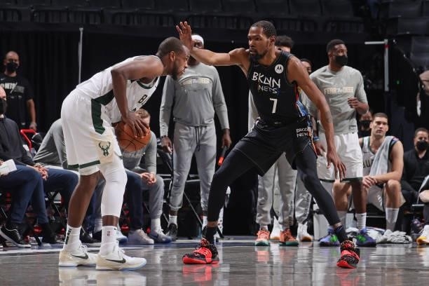 Kevin Durant of the Brooklyn Nets plays defense on Khris Middleton of the Milwaukee Bucks during Round 2, Game 5 of the 2021 NBA Playoffs on June 15,...