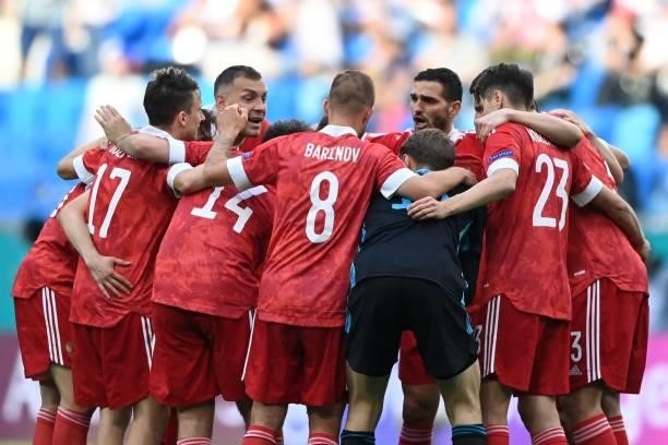 Russia's players huddle prior to the UEFA EURO 2020 Group B football match between Finland and Russia at the Saint Petersburg Stadium in Saint...