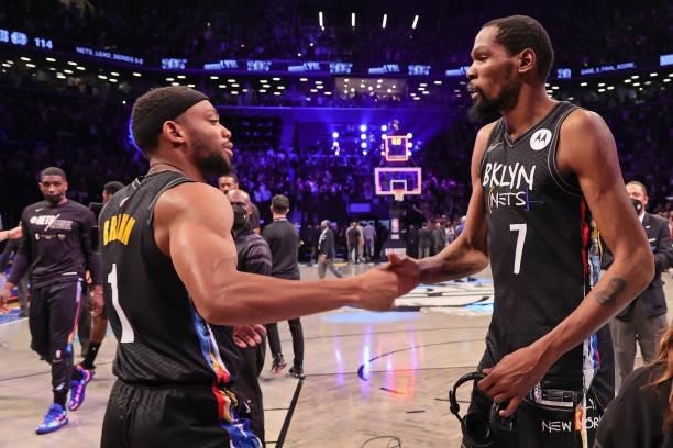 Kevin Durant and Bruce Brown of the Brooklyn Nets shake hands after the game against the Milwaukee Bucks during Round 2, Game 5 of the 2021 NBA...