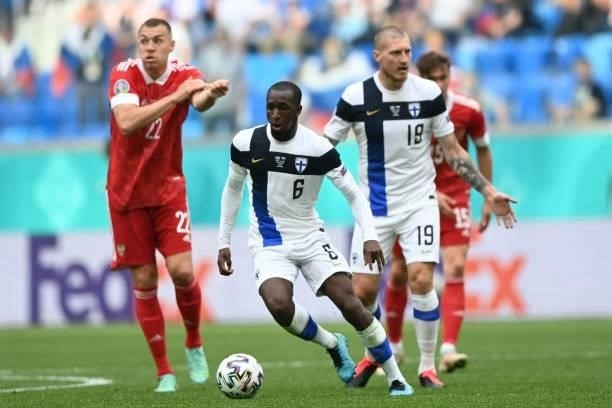Finland's midfielder Glen Kamara controls the ball during the UEFA EURO 2020 Group B football match between Finland and Russia at the Saint...