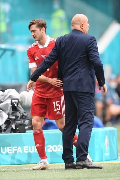 Russia's coach Stanislav Cherchesov greets Russia's forward Aleksey Miranchuk as he comes off during the UEFA EURO 2020 Group B football match...
