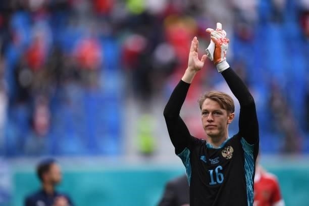 Russia's goalkeeper Matvei Safonov celebrates after the final whistle of the UEFA EURO 2020 Group B football match between Finland and Russia at the...