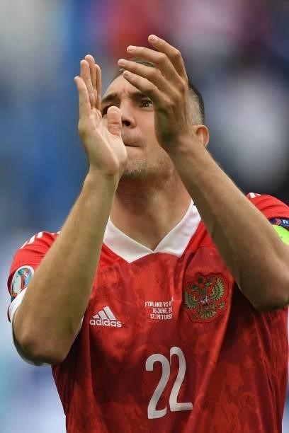 Russia's forward Artem Dzyuba celebrates after the final whistle of the UEFA EURO 2020 Group B football match between Finland and Russia at the Saint...