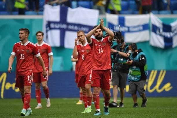 Russia's players celebrate after the final whistle of the UEFA EURO 2020 Group B football match between Finland and Russia at the Saint Petersburg...