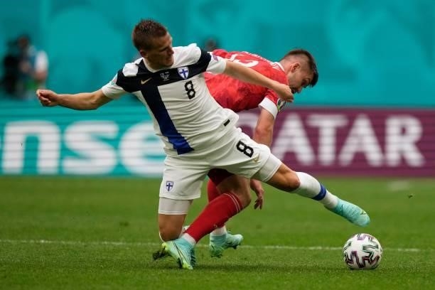 Finland's midfielder Robin Lod plays the ball during the UEFA EURO 2020 Group B football match between Finland and Russia at the Saint Petersburg...
