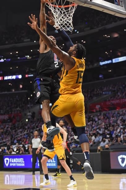 Kawhi Leonard of the LA Clippers dunks the ball against Derrick Favors of the Utah Jazz during Round 2, Game 4 of the 2021 NBA Playoffs on June 14,...