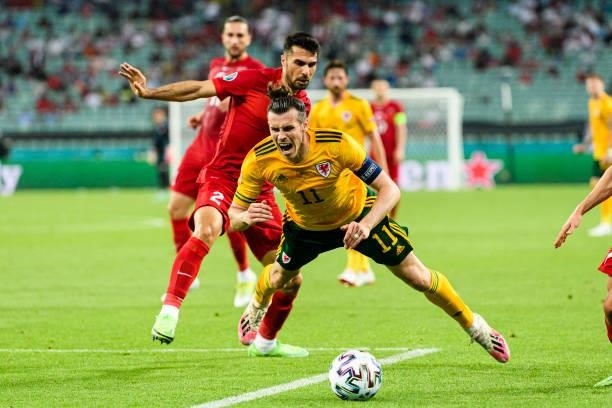 Gareth Bale of Wales receives a foul inside the penalty area from Mehmet Zeki Celik of Turkey during the UEFA Euro 2020 Championship Group A match...