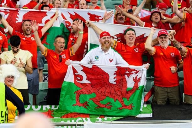 Wales supporters celebrate after winning against Turkey during the UEFA Euro 2020 Championship Group A match between Turkey and Wales on June 16,...