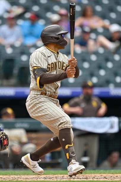 Trent Grisham of the San Diego Padres hits a third inning two-run homerun against the Colorado Rockies at Coors Field on June 16, 2021 in Denver,...
