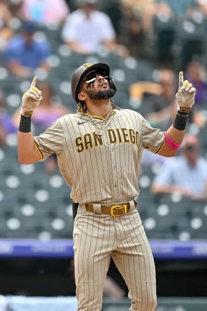 Fernando Tatis Jr. #23 of the San Diego Padres celebrates after hitting a third inning solo homerun against the Colorado Rockies at Coors Field on...