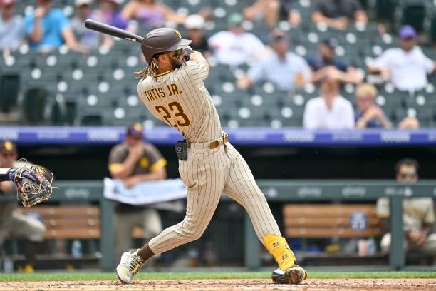 Fernando Tatis Jr. #23 of the San Diego Padres hits a third inning solo homerun against the Colorado Rockies at Coors Field on June 16, 2021 in...