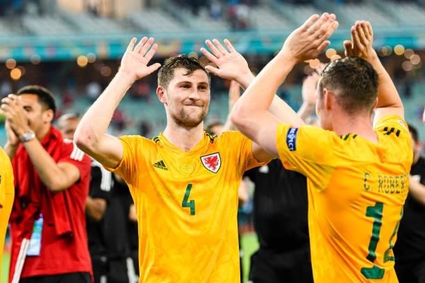 Ben Davies of Wales celebrating with his supporters and teammates after winning against Turkey during the UEFA Euro 2020 Championship Group A match...
