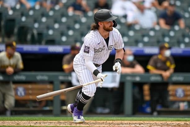 Brendan Rodgers of the Colorado Rockies hits a third inning RBI single against the San Diego Padres at Coors Field on June 16, 2021 in Denver,...