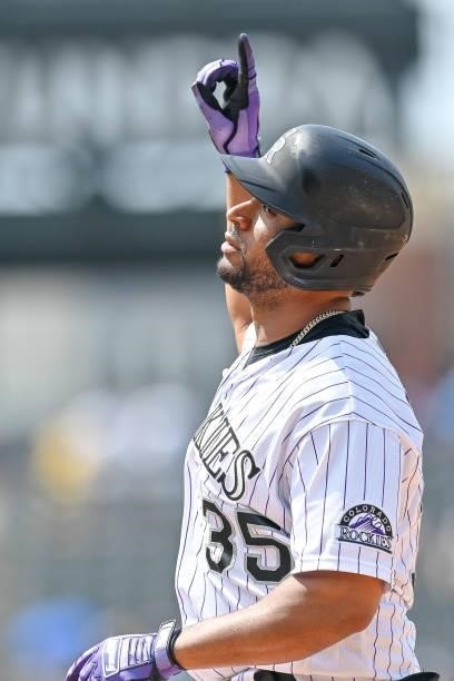 Elias Diaz of the Colorado Rockies celebrates a single in the fifth inning against the San Diego Padres at Coors Field on June 16, 2021 in Denver,...