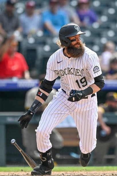 Charlie Blackmon of the Colorado Rockies hits a ninth inning walk off RBI single against the San Diego Padres at Coors Field on June 16, 2021 in...