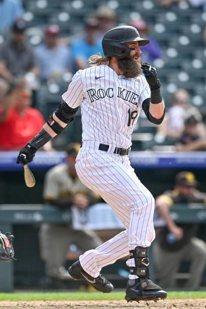 Charlie Blackmon of the Colorado Rockies hits a ninth inning walk off RBI single against the San Diego Padres at Coors Field on June 16, 2021 in...